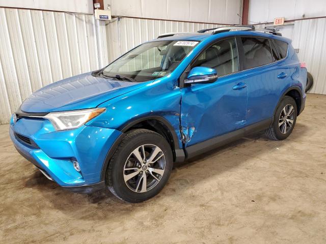 JTMRFREV3GD176963 - 2016 TOYOTA RAV4 XLE BLUE photo 1