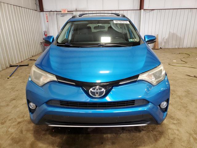 JTMRFREV3GD176963 - 2016 TOYOTA RAV4 XLE BLUE photo 5