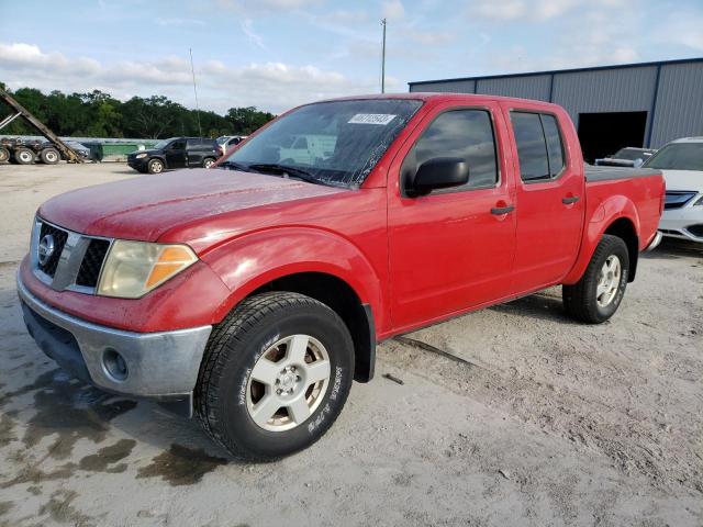 1N6AD07W95C431667 - 2005 NISSAN FRONTIER CREW CAB LE RED photo 1