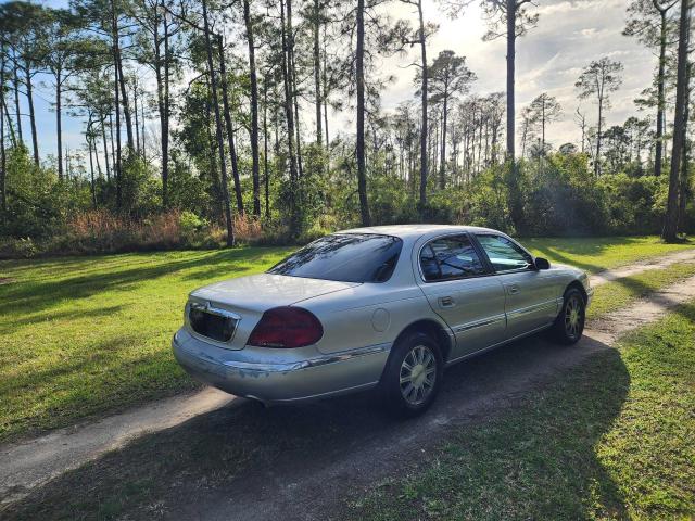 1LNHM97V52Y664176 - 2002 LINCOLN CONTINENTA SILVER photo 4