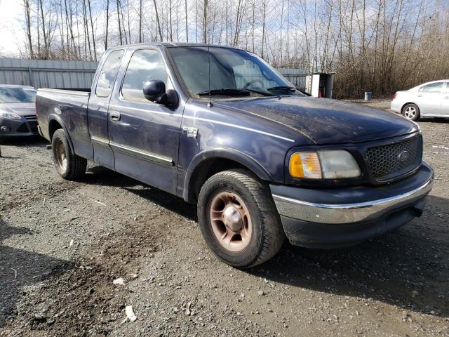 1FTRX17W11NB83660 - 2001 FORD F150 BLUE photo 4