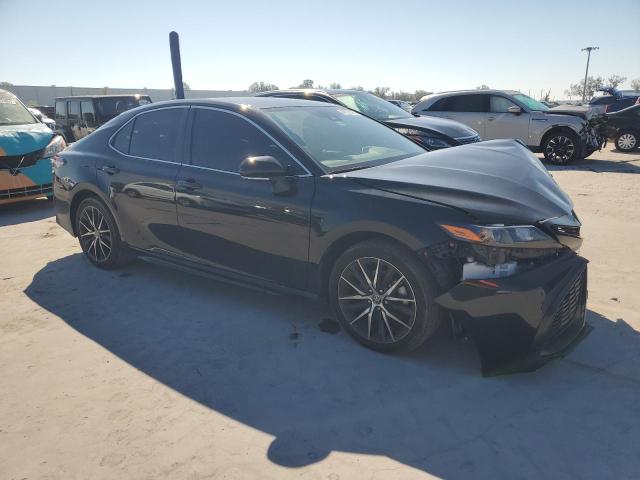 4T1G11AK4PU734558 - 2023 TOYOTA CAMRY SE NIGHT SHADE BLACK photo 4