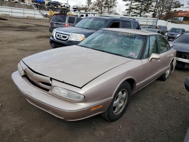 1G3HN52K5X4817077 - 1999 OLDSMOBILE 88 BASE BEIGE photo 1