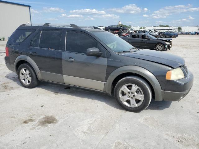 1FMDK02177GA23743 - 2007 FORD FREESTYLE SEL BLACK photo 4