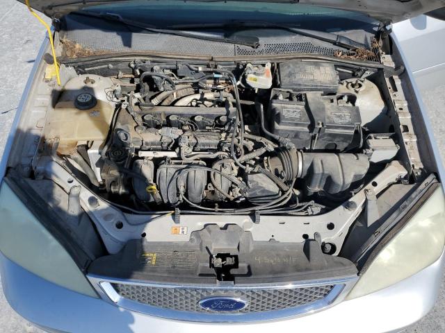 1FAFP34N07W237503 - 2007 FORD FOCUS ZX4 SILVER photo 11