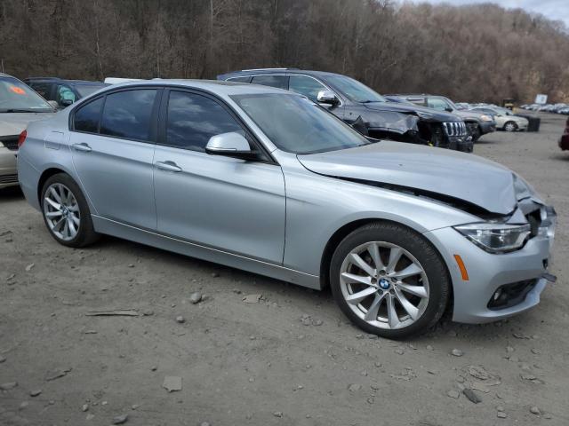 WBA8A3C57JA357595 - 2018 BMW 320 XI SILVER photo 4