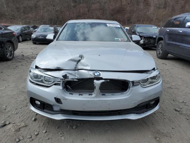 WBA8A3C57JA357595 - 2018 BMW 320 XI SILVER photo 5