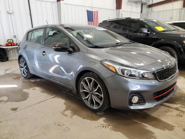 3KPFN5A32JE231928 - 2018 KIA FORTE EX GRAY photo 4