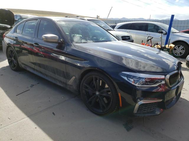 WBAJS7C05LCD28729 - 2020 BMW M550XI BLUE photo 4