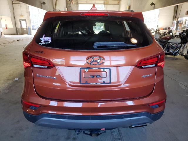 5XYZU3LB6HG465673 - 2017 HYUNDAI SANTA FE S ORANGE photo 6