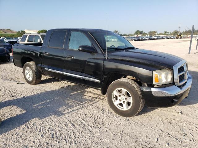 1D7HE58N56S556602 - 2006 DODGE DAKOTA QUAD LARAMIE BLACK photo 4