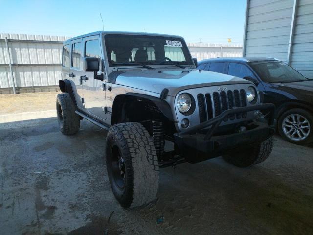 1C4BJWEG8GL132558 - 2016 JEEP WRANGLER U SAHARA GRAY photo 4