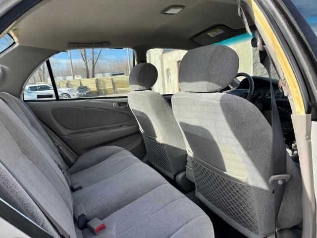 1Y1SK528XYZ411220 - 2000 CHEVROLET GEO PRIZM BASE SILVER photo 6