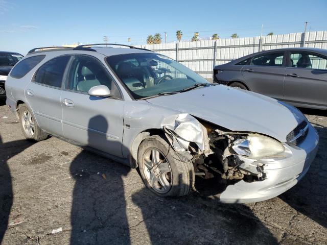 1FAFP59S62A140421 - 2002 FORD TAURUS SEL SILVER photo 4