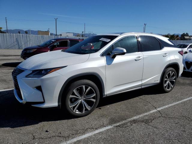 2T2BGMCA6JC025679 - 2018 LEXUS RX 450H BASE WHITE photo 1