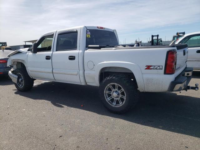 2GCEK13T441399677 - 2004 CHEVROLET SILVERADO K1500 WHITE photo 2