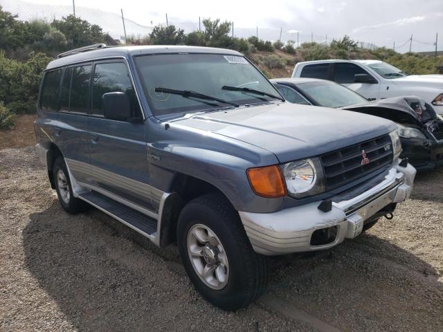 JA4MR51RXXJ007196 - 1999 MITSUBISHI MONTERO BLUE photo 1