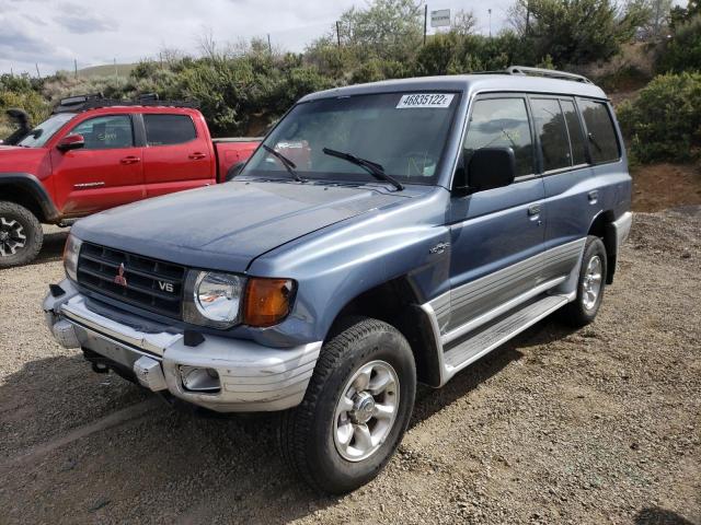 JA4MR51RXXJ007196 - 1999 MITSUBISHI MONTERO BLUE photo 2