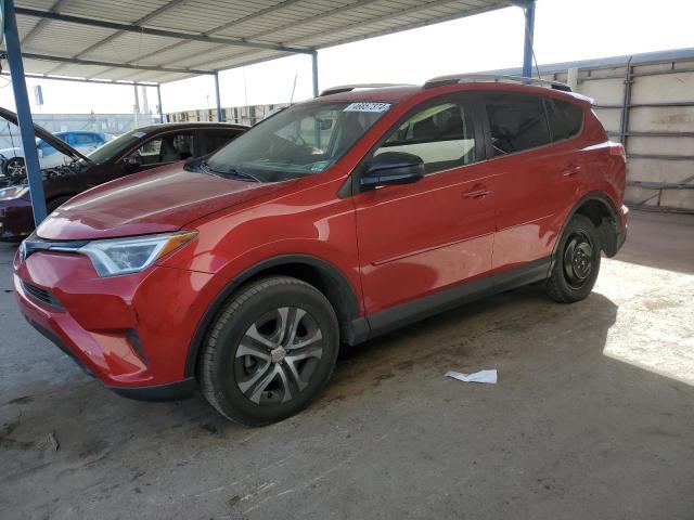 JTMBFREV7GJ086489 - 2016 TOYOTA RAV4 LE RED photo 1