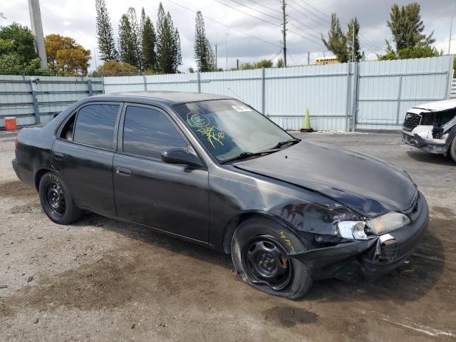 1NXBR12E7XZ167192 - 1999 TOYOTA COROLLA VE BLACK photo 4