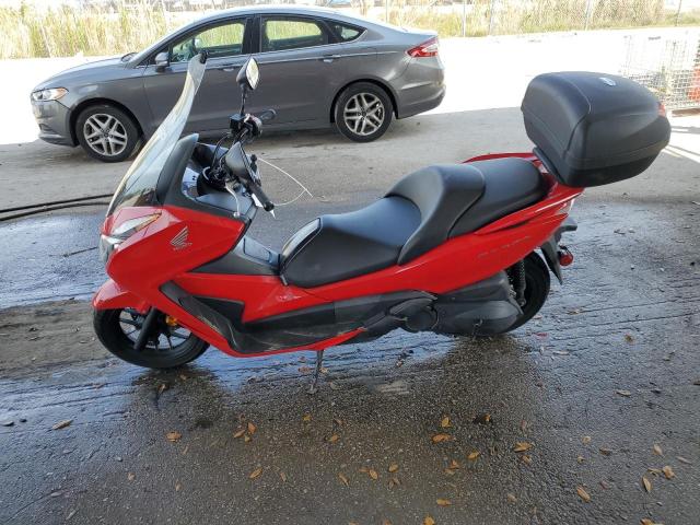 MLHNF0408E5000950 - 2014 HONDA NSS300 RED photo 3