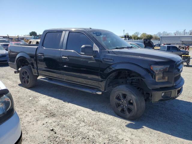 1FTEW1CG2FKE65704 - 2015 FORD F150 SUPERCREW BLACK photo 4