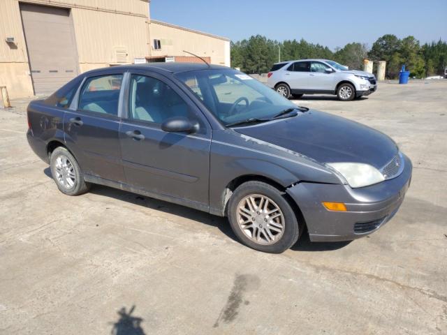 1FAFP34N17W300933 - 2007 FORD FOCUS ZX4 GRAY photo 4