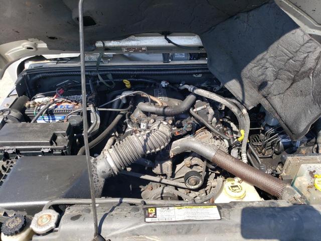 1J4HA5H10AL115427 - 2010 JEEP WRANGLER U SAHARA SILVER photo 11