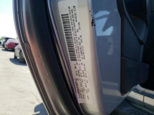 1J4HA5H10AL115427 - 2010 JEEP WRANGLER U SAHARA SILVER photo 12