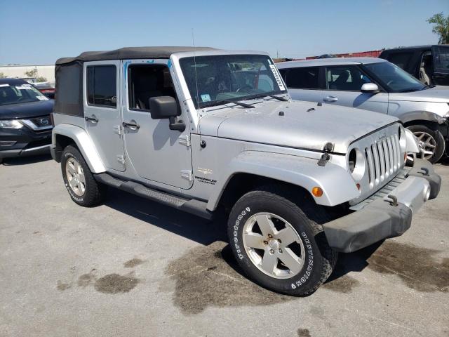 1J4HA5H10AL115427 - 2010 JEEP WRANGLER U SAHARA SILVER photo 4