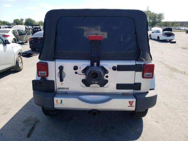 1J4HA5H10AL115427 - 2010 JEEP WRANGLER U SAHARA SILVER photo 6
