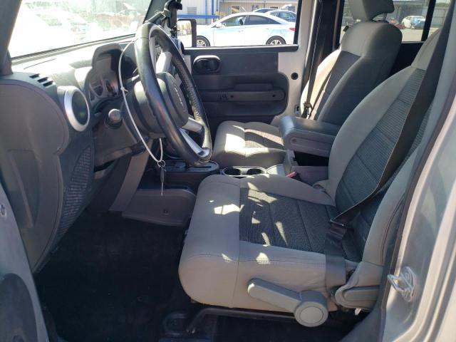 1J4HA5H10AL115427 - 2010 JEEP WRANGLER U SAHARA SILVER photo 7