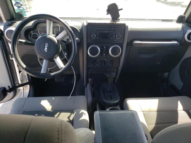 1J4HA5H10AL115427 - 2010 JEEP WRANGLER U SAHARA SILVER photo 8