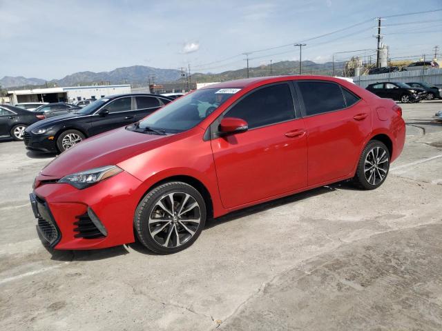 5YFBURHE8JP795551 - 2018 TOYOTA COROLLA L RED photo 1