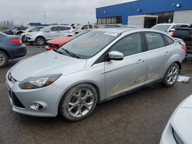 1FAHP3J29CL139231 - 2012 FORD FOCUS TITANIUM SILVER photo 1