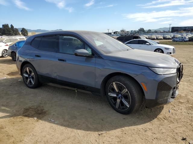 WB523CF08RCR31149 - 2024 BMW IX XDRIVE50 BLUE photo 4