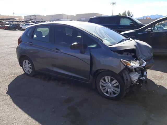 JHMGK5H52GX031952 - 2016 HONDA FIT LX GRAY photo 4