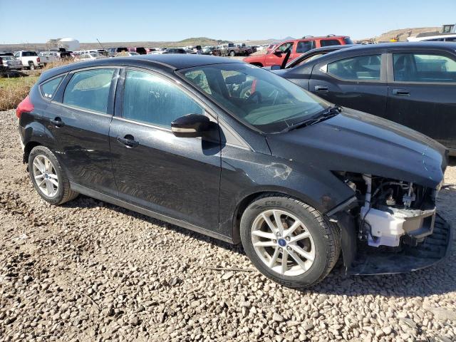 1FADP3K22FL282426 - 2015 FORD FOCUS SE BLACK photo 4