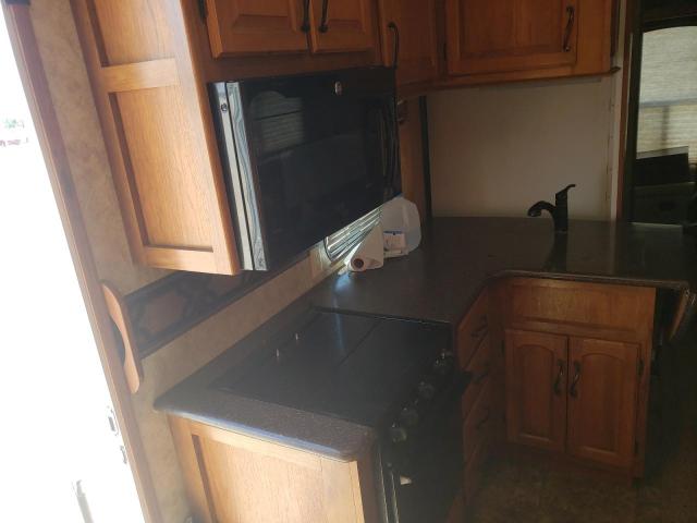 4YDF31529C4701518 - 2012 KEYSTONE MONTANA WHITE photo 9