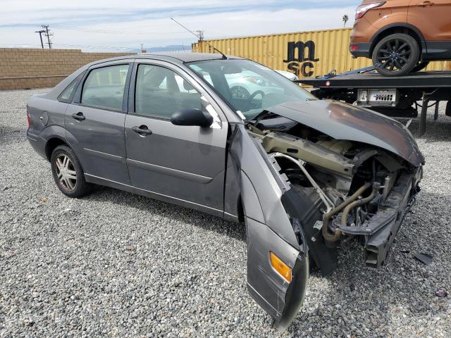 1FAFP34Z73W264047 - 2003 FORD FOCUS SE COMFORT GRAY photo 4