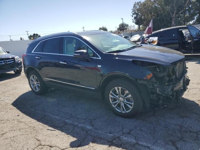 1GYKNCRS9MZ175942 - 2021 CADILLAC XT5 PREMIUM LUXURY BLUE photo 4