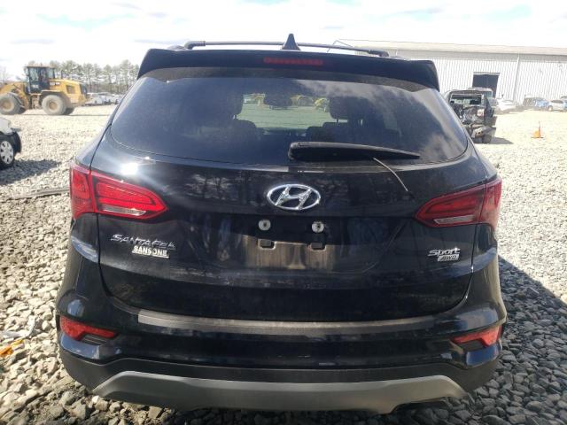 5NMZUDLB4HH008291 - 2017 HYUNDAI SANTA FE S BLACK photo 6