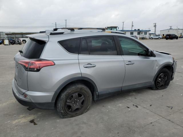 2T3BFREV1GW528653 - 2016 TOYOTA RAV4 LE SILVER photo 3