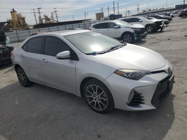 5YFBURHE3HP619985 - 2017 TOYOTA COROLLA L SILVER photo 4