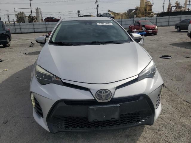 5YFBURHE3HP619985 - 2017 TOYOTA COROLLA L SILVER photo 5