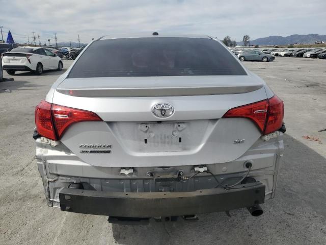 5YFBURHE3HP619985 - 2017 TOYOTA COROLLA L SILVER photo 6