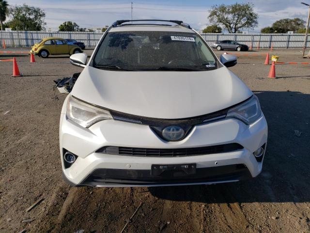 JTMDJREV4JD230724 - 2018 TOYOTA RAV4 HV LIMITED WHITE photo 5