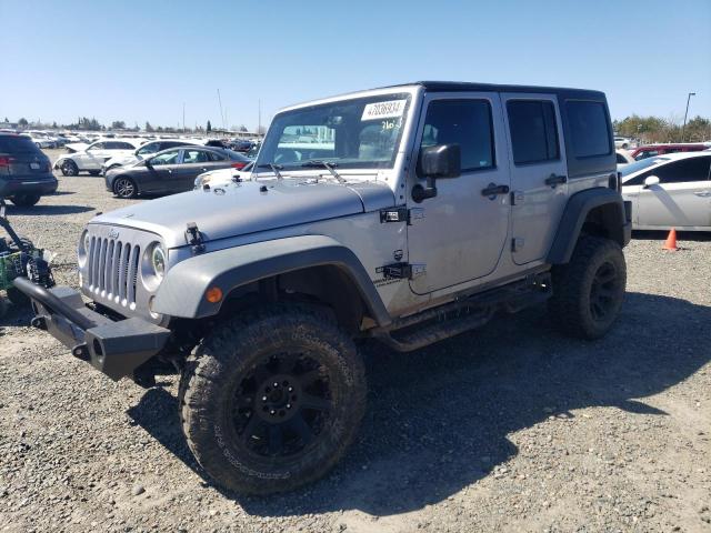 1C4HJWDG4GL246956 - 2016 JEEP WRANGLER U SPORT SILVER photo 1