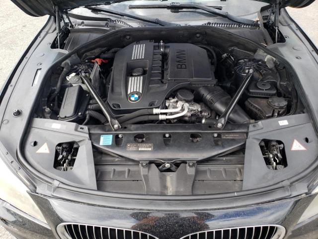 WBAKB4C57BC574143 - 2011 BMW 7 SERIES LI შავი ფოტო 11