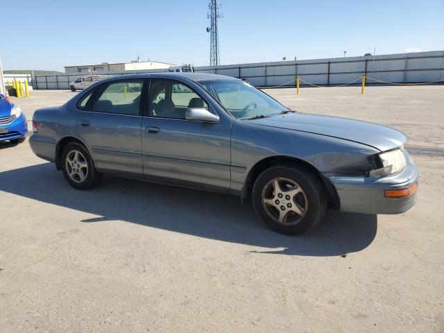 4T1BF12B9VU140698 - 1997 TOYOTA AVALON XL BLUE photo 4